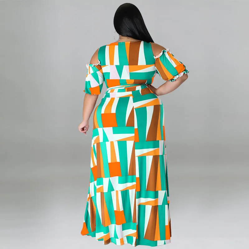 Bold Geometric Print Off-Shoulder Wrap Top and High-Slit Maxi Skirt Set